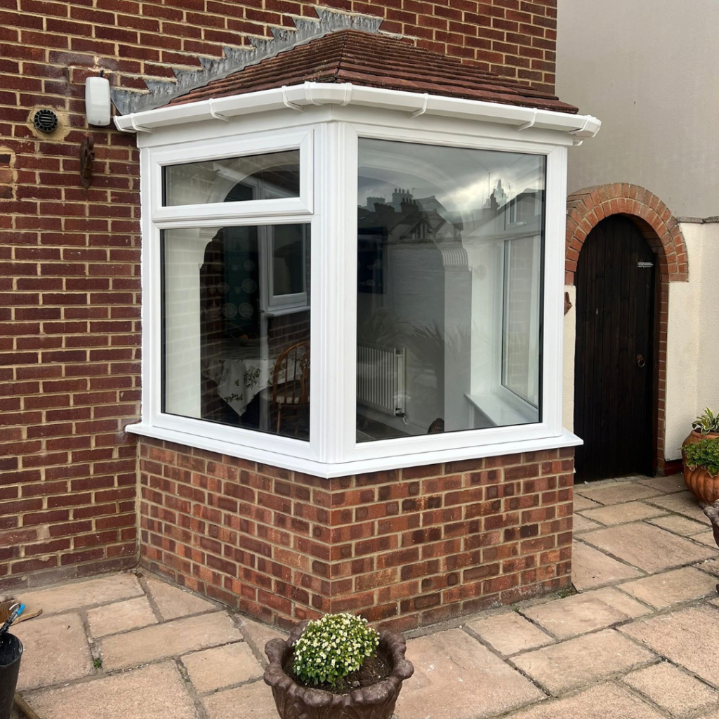 large bay window with white frame