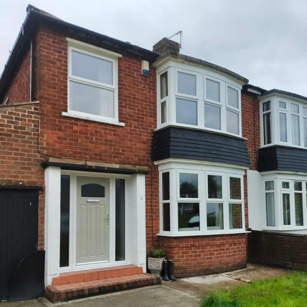full house refit with white framed window and pale green door